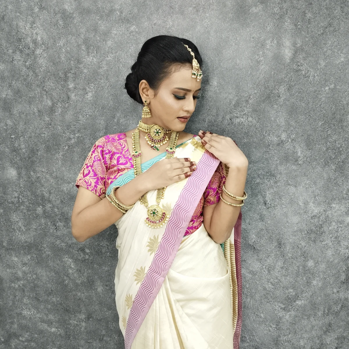 Party ready makeup look with winged eyeliner and highlighted cheekbones for modern glam style